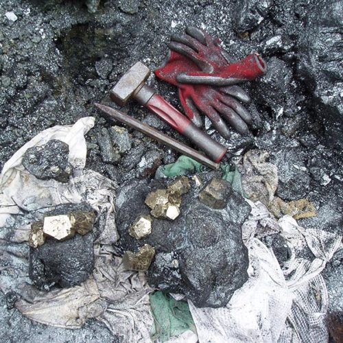 Pyrite and hematite specimens mining in Parco Minerario dell'Isola d'Elba, Rio Marina, Elba island, Italy. Marco Lorenzoni photos